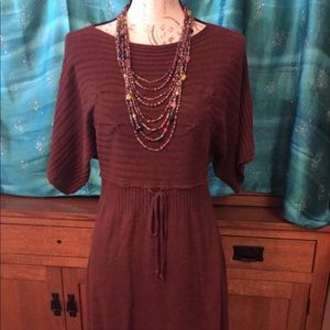 A beautiful rich rust colored sweater dress